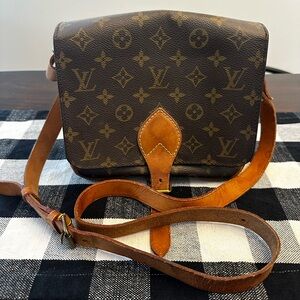 Antique Louis Vuitton crossbody.